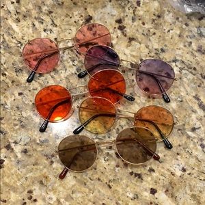 a bundle of 5 sunglasses that are new, very chic